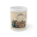 11oz white ceramic mug featuring a vintage postage stamp illustration of the Rome skyline in watercolor with a navy postmark.