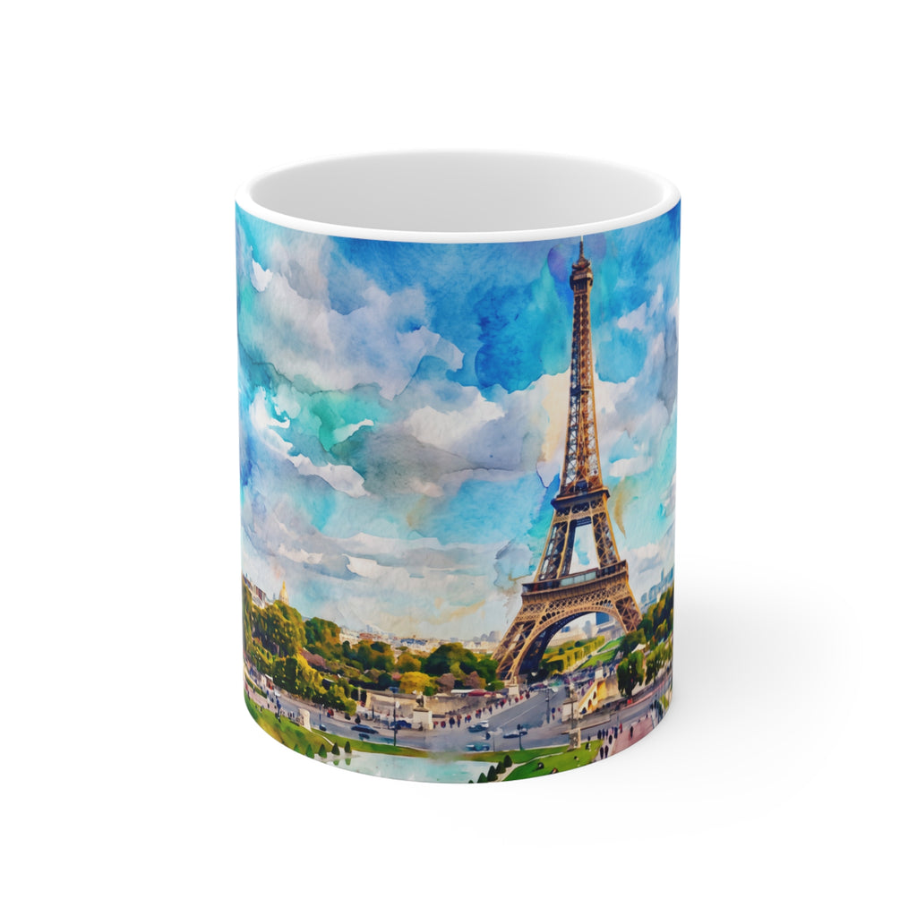 White 11oz ceramic mug featuring a vivid watercolor painting of the Eiffel Tower with a blurred, artistic 3D effect.