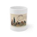 11oz white ceramic mug featuring a vintage postage stamp illustration of the Chicago skyline in watercolor with a postmark.