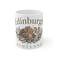 Mug with an Edinburgh emblem showing the castle on its rock, a unicorn, thistles and a ribbon, with the word Scotland below